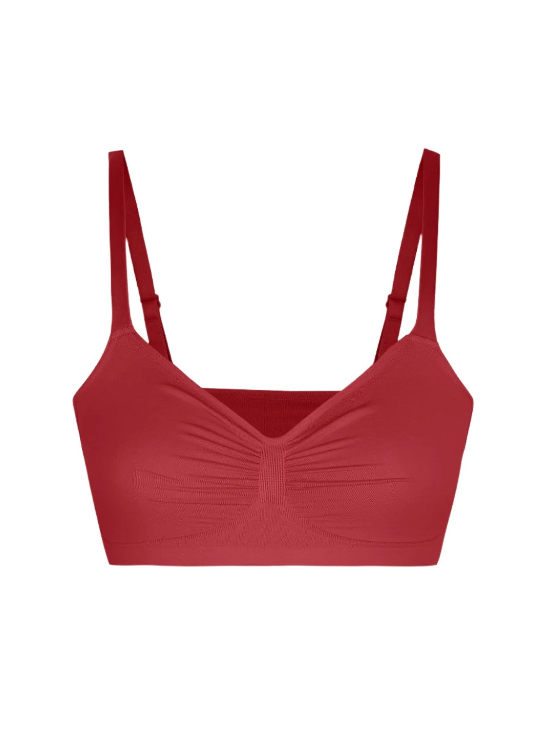 Red bralette with thin straps on a light gray background